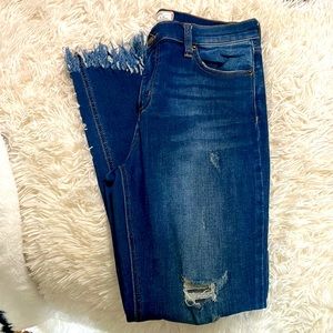 Free People distressed jeans with fringed hem